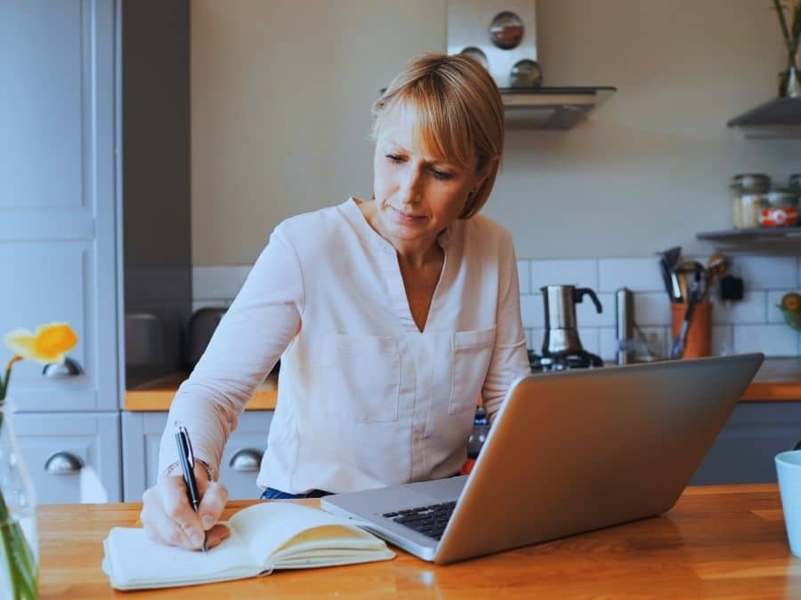 Woman comparing DIY Investing vs using a professional financial adviser
